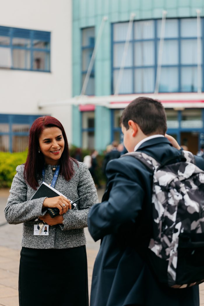 Mrs Shariff talks to student